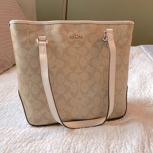 Beige Cream and Tan Coach Purse with dark brown interior